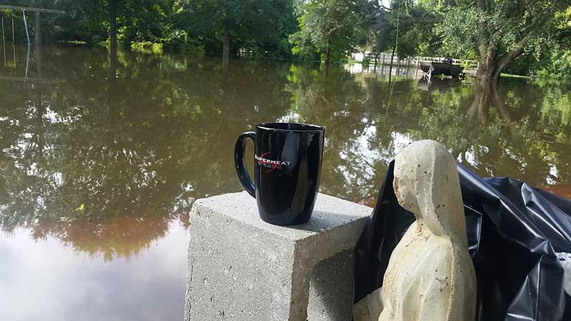 Enjoying a cup of coffee during the floor in Louisianna